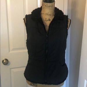 CAbi Black faux fur lined vest with pockets SZ M